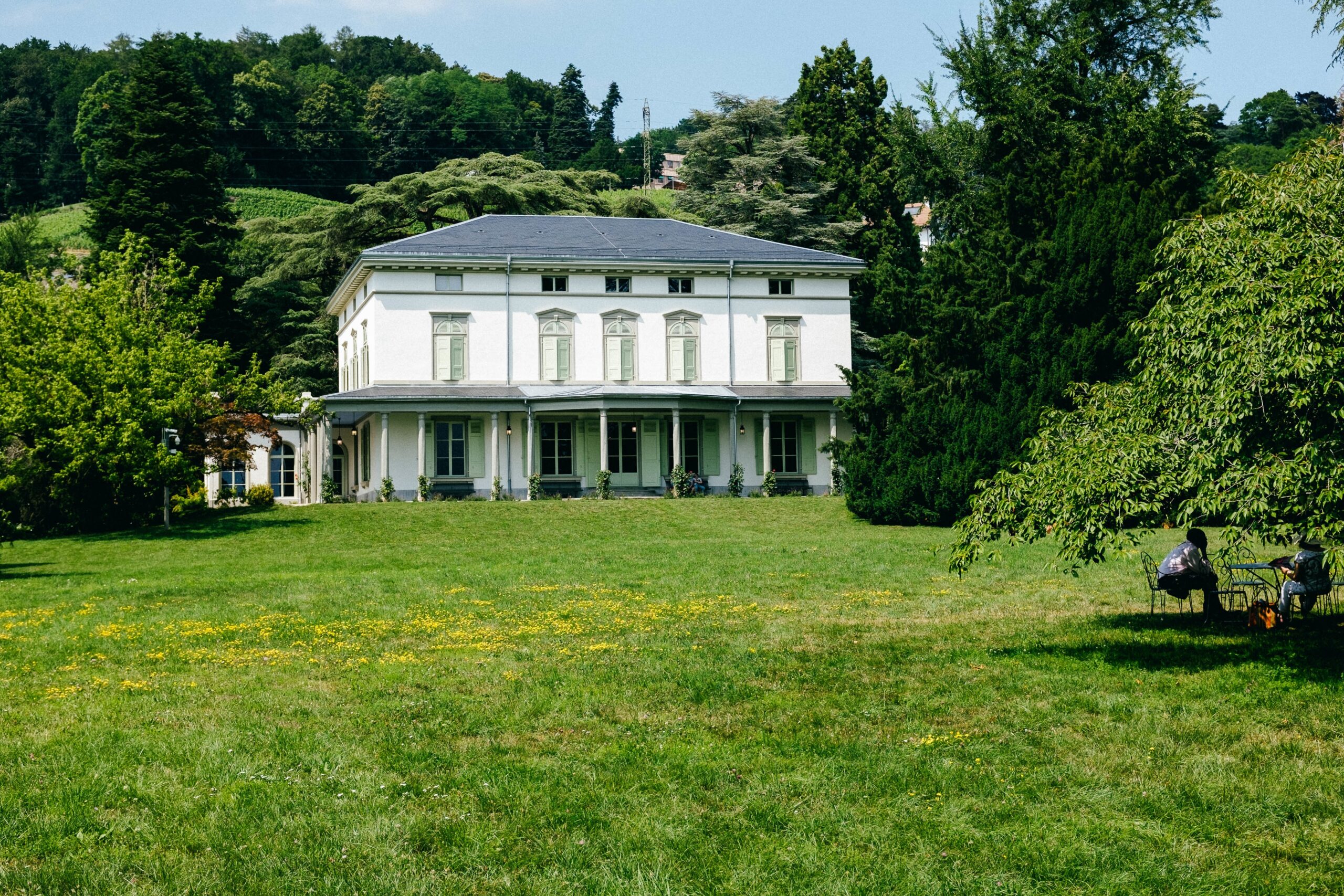 beautiful shot of chaplin's world museum in switzerland surrounded by lush nature